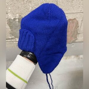 J.Crew knitted blue hat with fleece insides and ties.